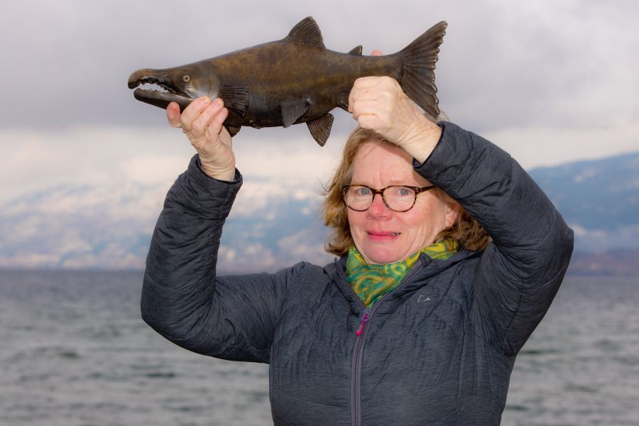 <who>Photo Credit: NowMedia</who> Trinita Waller triumphantly holds her returned salmon