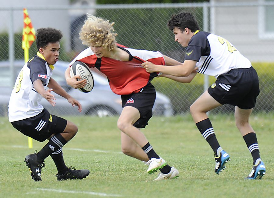 Cruz Fisher, centre, proved to be an inspirational leader for the Mt. Boucherie Junior Bears.