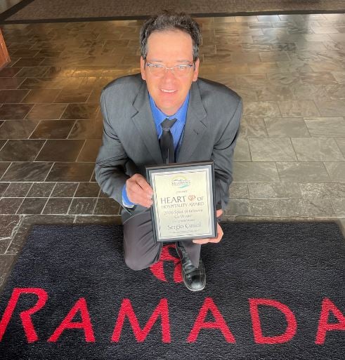 </who>Sergio Cunial, the conference manager at Kelowna Ramada hotel, was the co-winner of the Spirit of Kelowna trophy.
