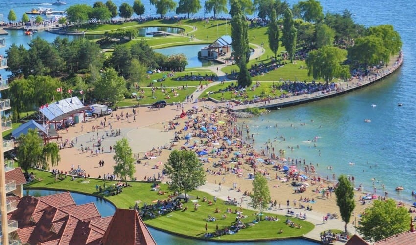 </who>Tourism officials want to see a return to normal to fill up beaches like this one in Kelowna.