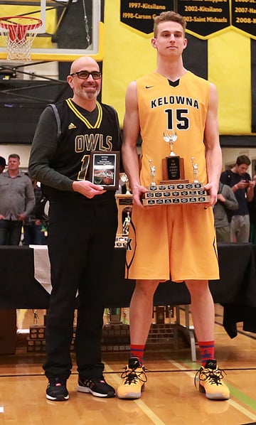 <who>Photo Credit: JA Csek/KelownaNow.com </who>Grant Shephard, was named the MVP and best Owl. Presenting <br>him with an award is KSS alumnus, David Lafontaine.