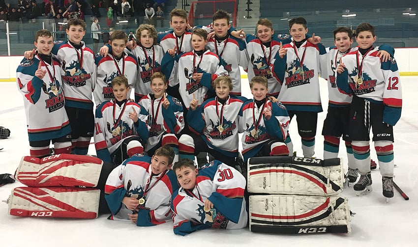 <who>Photo Credit: Contributed </who>The Kelowna Tier 1 Peewee Rockets swept all six games on the way to winning their own KMHA tournament on the weekend. Members of the championship team, coached by Byron Ritchie and Jason Tansem, are, from left, front: Dylan Adams and Conner Nicolson. Middle: Ruben Stone, Jake Skogstad, Callum Stone and Kaslo Ferner. Back: Christopher Kilduff, Lynden Lakovic, Ethan MacKenzie, Seth Tansem, Jaxsin Vaughan, Ryder Ritchie, Corbin Vaughan, Maddix McCagherty, Max Finley, Ryan Richardson and Aiden Bruce.