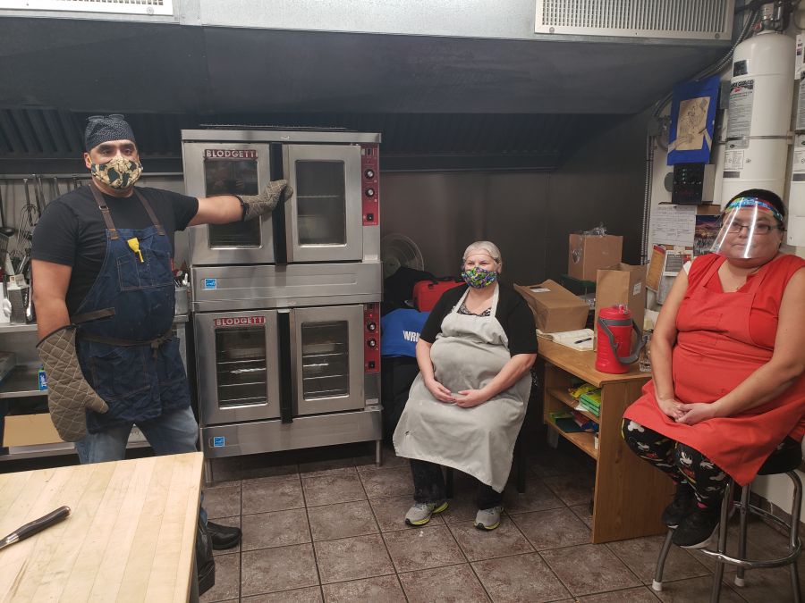<who> Photo Credit: NowMedia </who> Mike Wright and his cooking elves at Unity House.