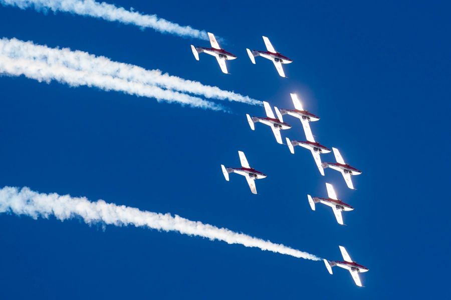 <who>Photo Credit: NowMedia</who> The Snowbirds perform over Penticton in 2019