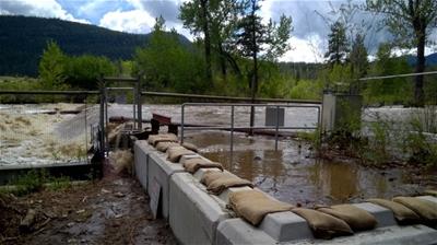 <who>Photo Credit: RDOS </who>District of Summerland CAO Linda Tynan told council Monday evening that flooding concerns along Aeneas Creek and Trout Creek remain high due to warm temperatures and rapidly melting snowpack.