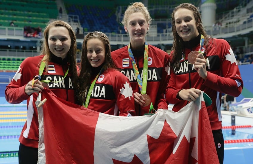 <who> Photo Credit: Canadian Olympic Committee, Jason Ranson. </who> From L to R: Brittany MacLean, Katerine Savard, Taylor Ruck and Penny Oleksiak. 