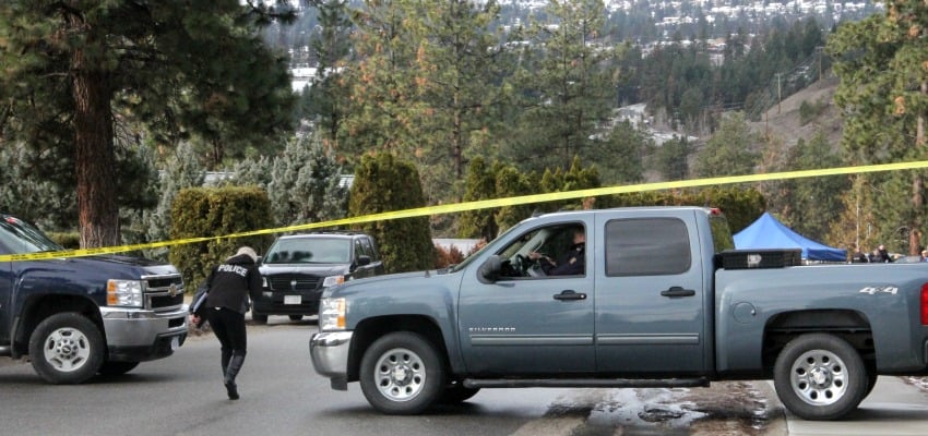 <who> Photo Credit: KelownaNow.com. </who> RCMP officers were going door-to-door in the Shannon Lake neighbourhood to get information from residents. 