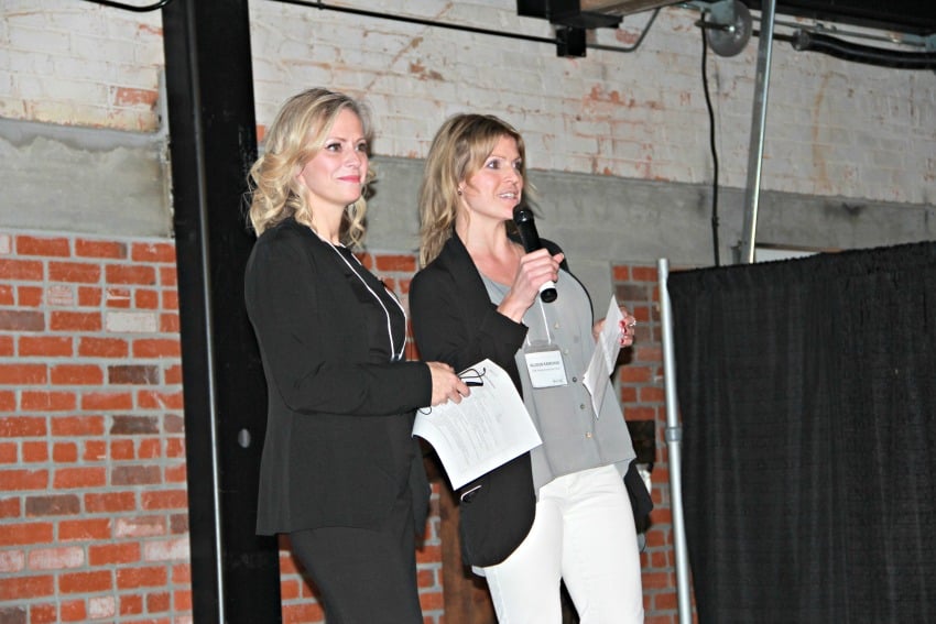 <who> Photo Credit: KelownaNow.com </who> Tara Tschritter and Allison Ramchuk thank guests for coming to the launch event. 