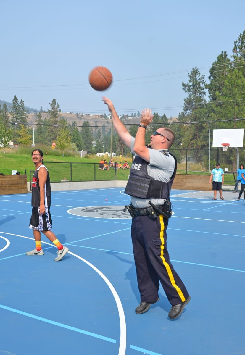 <who>Photo Credit: Jacquie Biblow</who>Corporal Mike Williams throwing up three-pointers with Will Swite in the new Sport Court