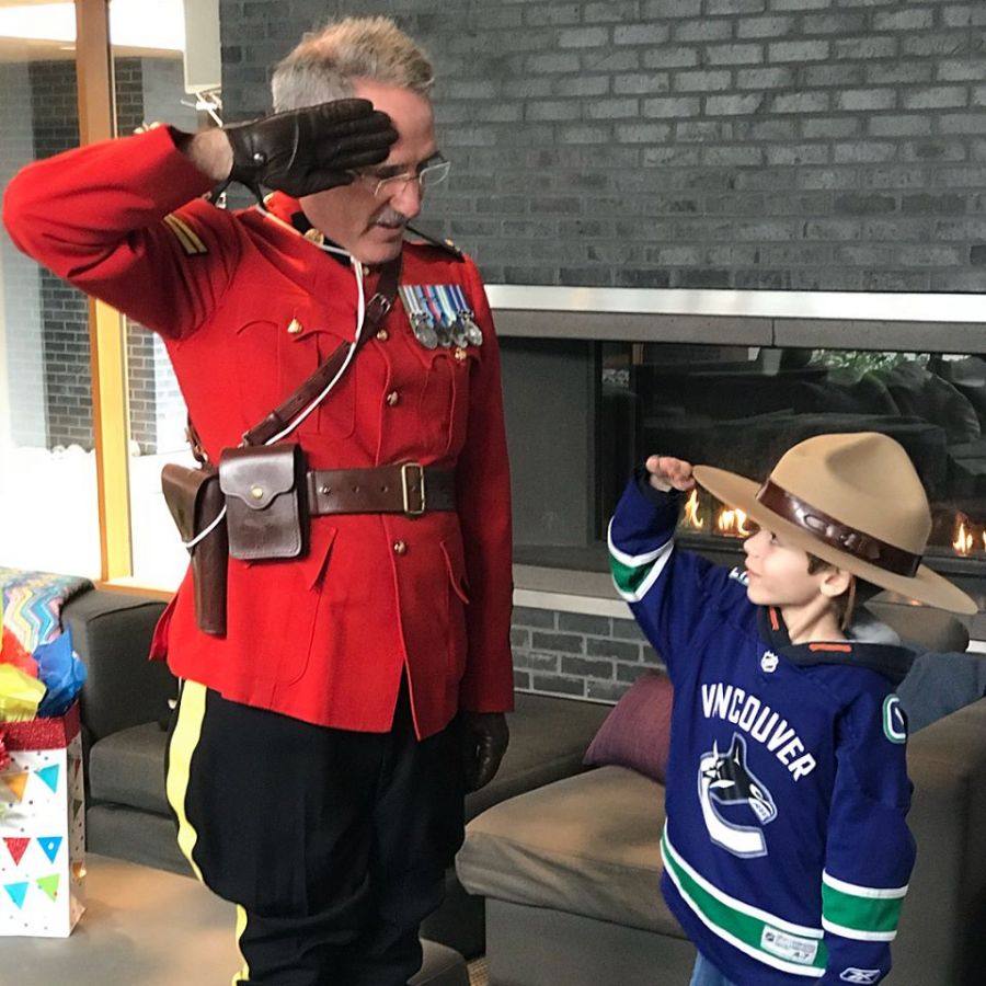 <who>Photo Credit: Facebook/Don Moskaluk</who>RCMP Cpl. Dan Moskaluk visited Wills Hodgkinson, 7, at Ronald McDonald House in Vancouver this past Saturday afternoon.