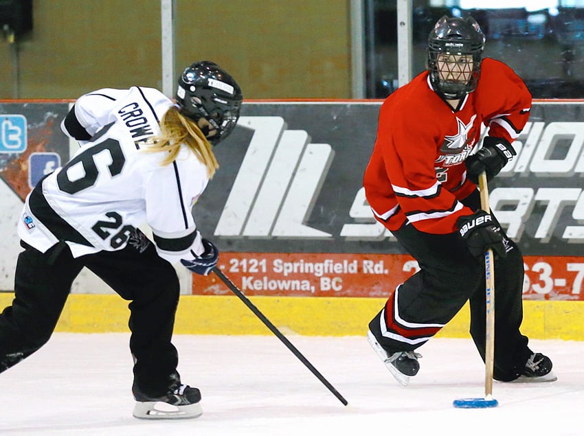<who>Photo Credit: Savannah Bagshaw/KelownaNow.com </who>Alyssa Racine of Vernon, right, scored for Team BC in a 2-2 first period against Manitoba.