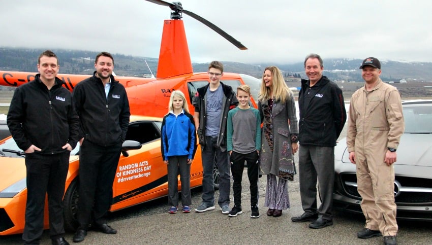 August Motorcar Representatives with the Donovan family at the Kelowna International Airport.