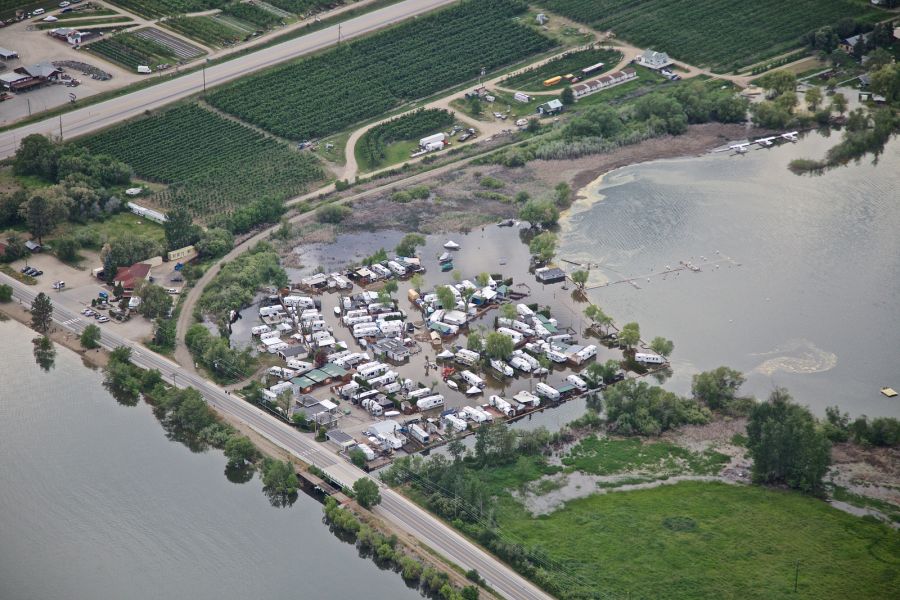 <who> Photo Credit: KelownaNow. </who> The isthmus between Wood and Kalamalka Lake at Tween Lakes Resort. 
