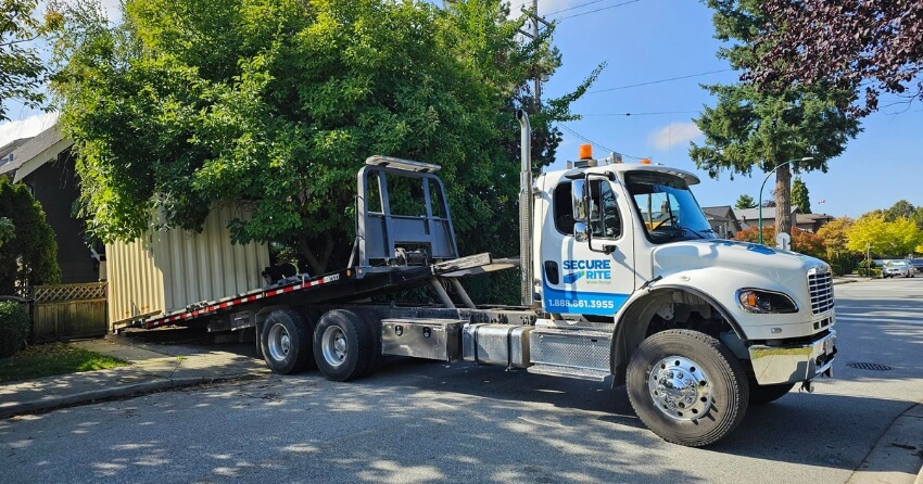 <who>Photo Credit: Secure-Rite Mobile Storage, Shipping container pickup in Kelowna