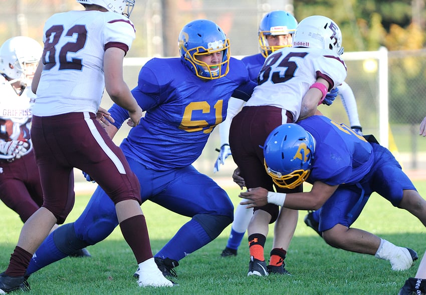 Caleb Aitken, centre, and Prince Manongdo, right, wrecked havoc on the Eric Hamber runners.