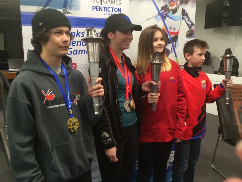 <who>Photo Credit: B.C. Games Society </who>The 2016 B.C. Winter Games torchbearers tonight in Penticton are, from left, Brayden Kuroda, Anna Spence, Caitlyn Riddle and Peter de la Mothe, all from the Penticton area.