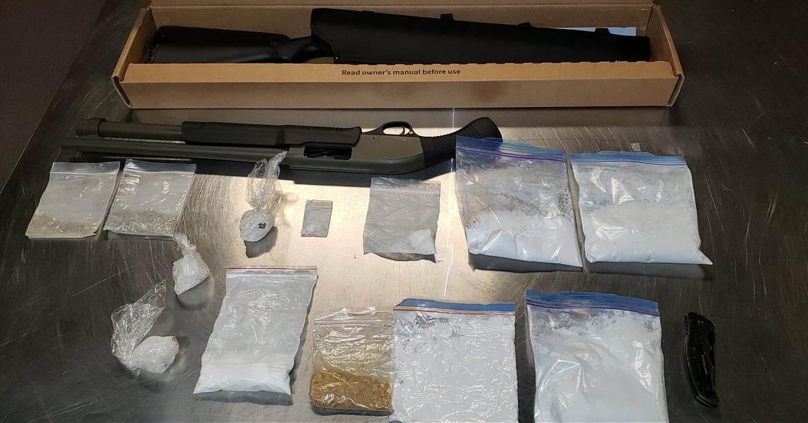 Kelowna RCMP finds drugs, weapons inside vehicle abandoned after ...