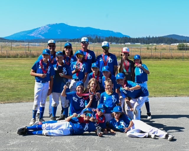 <who> Photo Credit: Contributed </who> Kelowna Sun Devils U11 team with their provincial bronze.