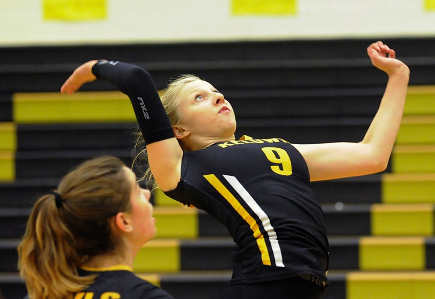 <who>Photo Credit: Lorne White/KelownaNow </who>Jaalah Ward of the Kelowna Owls goes high for a hit in playoff match on home court.