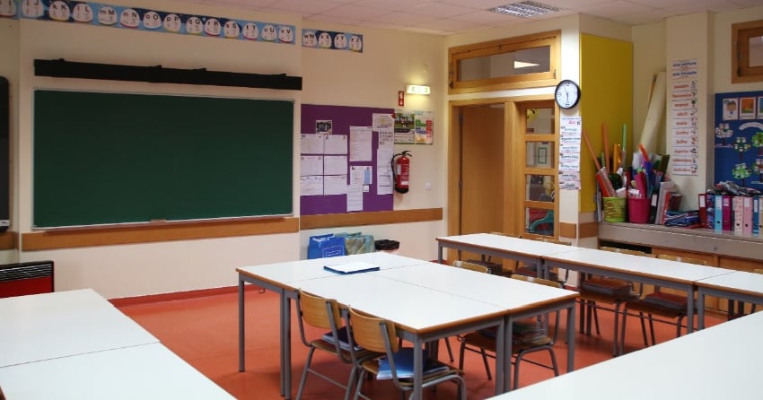<who> Photo credit: 123RF </who> A stock image showing a classroom.