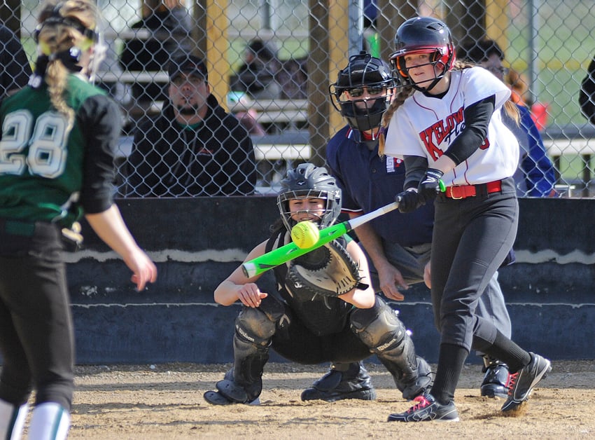 <who>Photo Credit: Lorne White/KelownaNow </who>Maddie Foster of the Kelowna Heat connects for a hit in an 8-7 win over Sherwood Park.