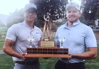 <who>Photo Credit: Contributed</who>Brandon Ortiz, left, and caddy/friend Tyron Deguise with Sunshine <br>Open trophy at Kamloops Golf and Country Club. 
