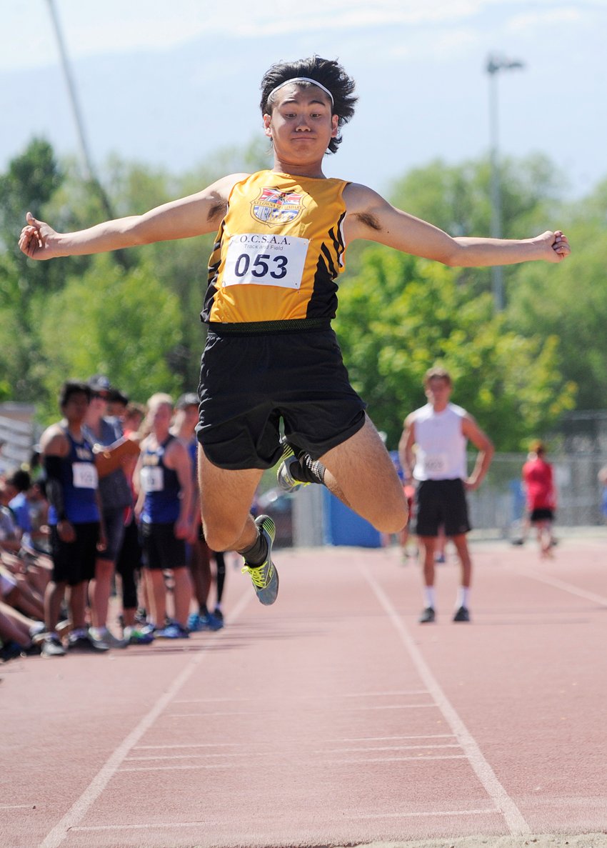<who>Photo Credit: Lorne White/KelownaNow </who>Nathan Tonogai of the KSS Owls finished second in the senior boys long jump.