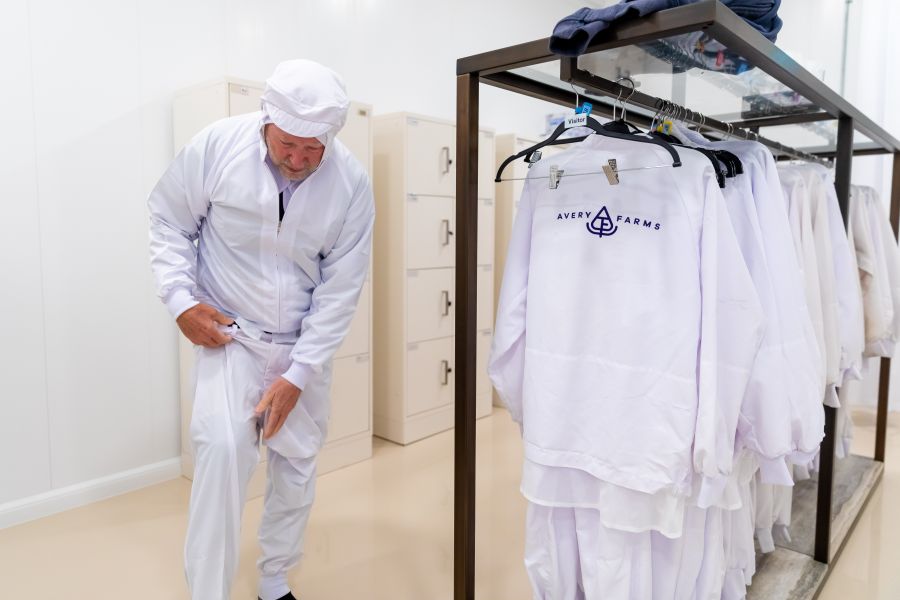 <who>Photo Credit: NowMedia/Gord Goble</who> Garry Peters suits up during decontamination