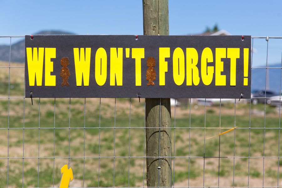 <who>Photo Credit: NowMedia</who> A PIB member's fence has become a makeshift memorial