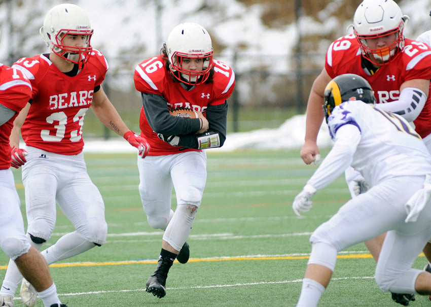 <who>Photo Credit: Lorne White/KelownaNow </who>Mt. Boucherie QB Dylan Milligan finds a hole in the Mt. Douglas defence for a long gain in the second quarter.