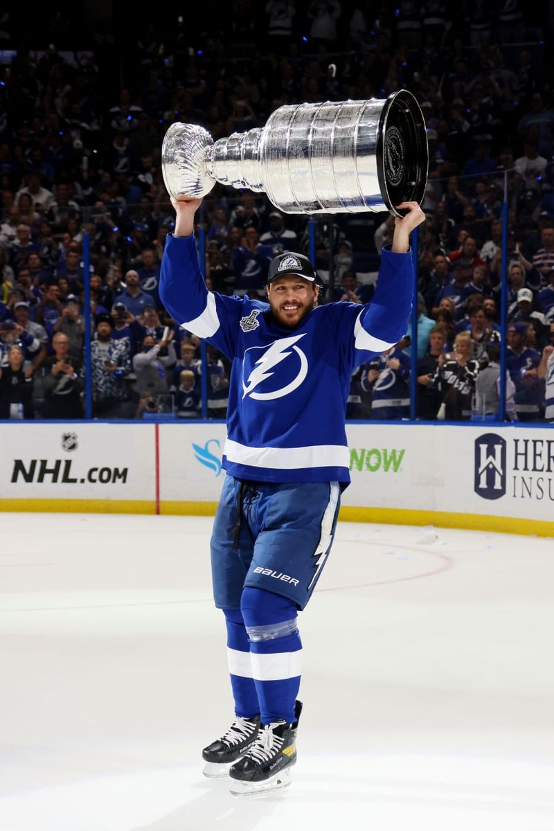 <who>Photo Credit: Getty Images</who>Schenn with the Stanley Cup in July.
