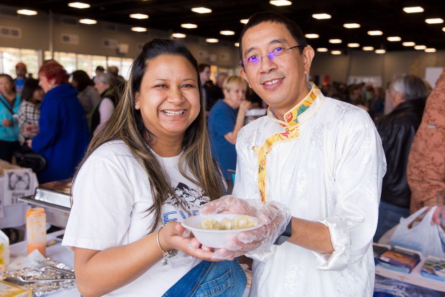 Laxmi Dangol and Ashish Lama served momos at the Nepal booth
