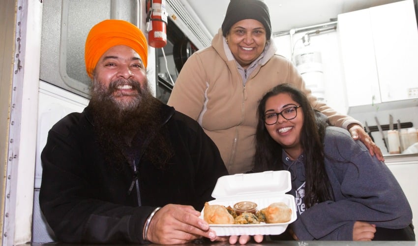 Baljit, Malkit, and Jaspreet Bhuhi at the Penticton Tree Light Up Festival.