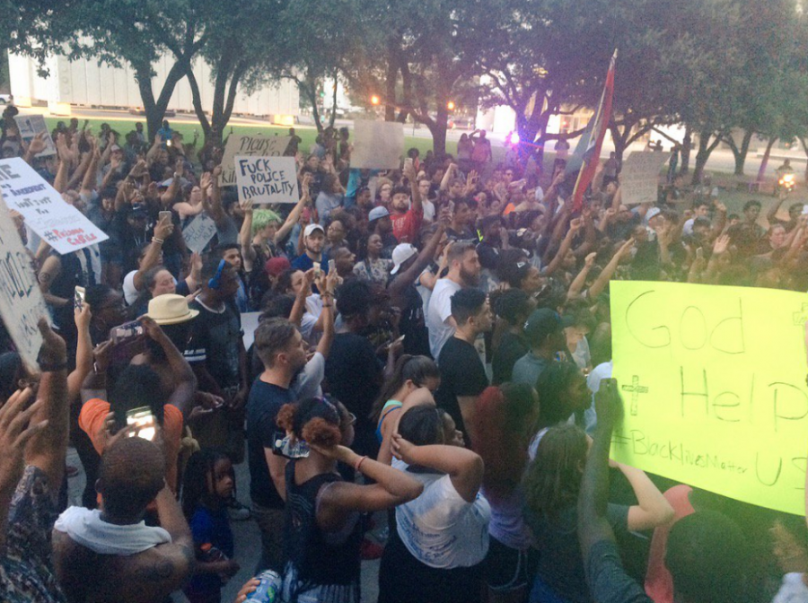 <who> Photo Credit: Dallas Police Dept. </who> The rally in downtown Dallas before the shooting.