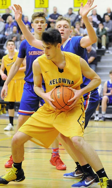 <who>Photo Credit: Lorne White/KelownaNow </who>Owen Keyes stood tall with 21 points and 10 rebounds.