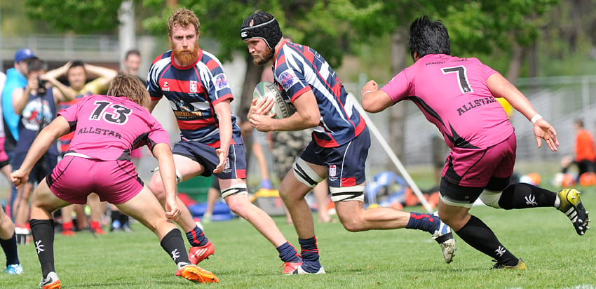 <who>Photo Credit: Lorne White/KelownaNow </who>Ryse Evans of the Crows looks for room to manoeuvre against the Highlanders in the second half of another lopsided victory.