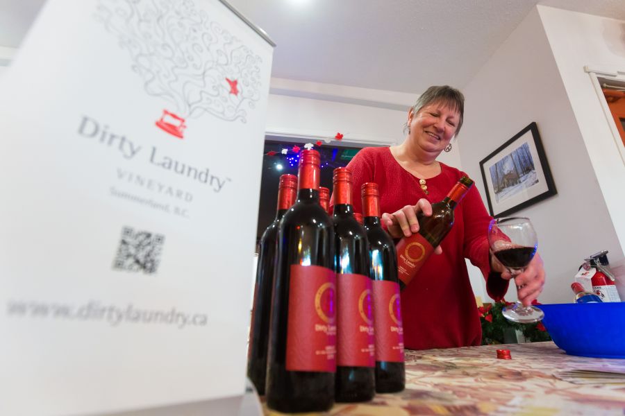 <who> Photo Credit: NowMedia</who>Dirty Laundry Vineyard served wine at Roch Maple during Summerland's "Sip'n'Shop."