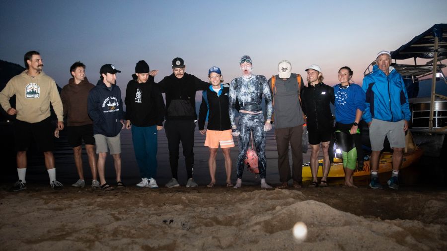 <who>PhotoCredit: NowMedia/Gord Goble</who> Swimmer and crew pose for a photo