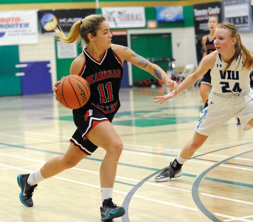 <who>Photo Credit: Lorne White/NowMedia </who>Anna Carter, left, of West Kelowna and her OC teammates hit the court on Friday beginning at 6 p.m.