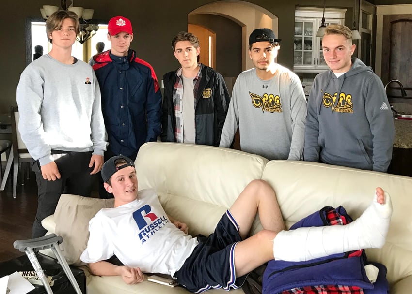 <who>Photo Credit: Contributed </who>Jadin Sjoquist of the OKM Huskies' soccer team got a surprise visit from KSS Owls, from left, Pietro Arrigoni, Jonah Donahue, Gregor Smith, Adrian Delgado and Chris West at his home two days after his leg was broken in an Okanagan Valley senior AAA game at OKM.