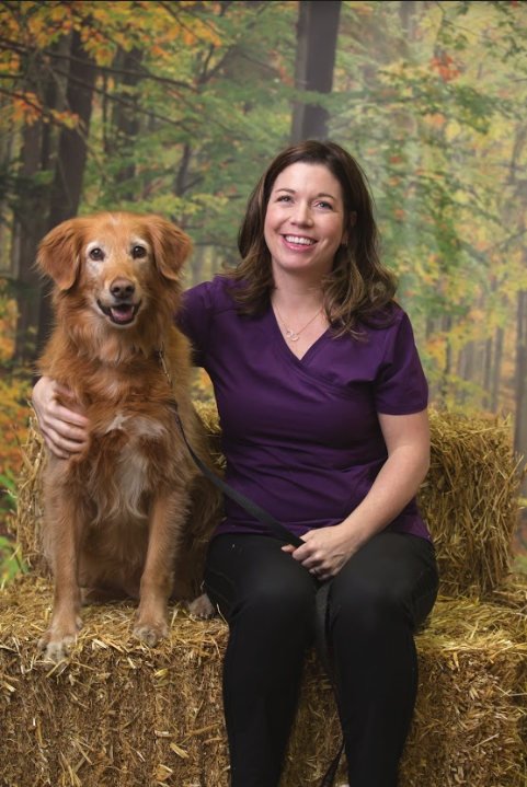 <who>Photo Credit: Summerland Animal Clinic</who> Dr. Julie Woodward and their Golden Retriever/Collie mix, Sophie