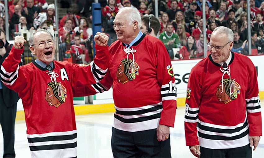 <who>Photo Credit: NHL.com </who>Wayne Hicks, right, was part of the 50th anniversary celebration for the 1961 Chicago Blackhawks' Stanley Cup-winning team. Pierre Pilote, left, and Ab McDonald are the other Hawks in this 2011 photo.