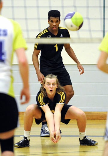 <who>Photo Credit: Lorne White/KelownaNow </who>Josh Liegman, foreground, and Matt Cespedes were two key <br>performers for the KSS Owls in their march to an Okanagan <br>Valley AAA volleyball title.