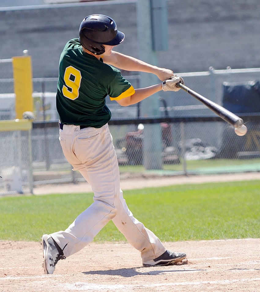 <who>Photo Credit: Lorne White/KelownaNow </who> Designated hitter, Carter Morris, connects for a hit on a UBC Thunder fastball.