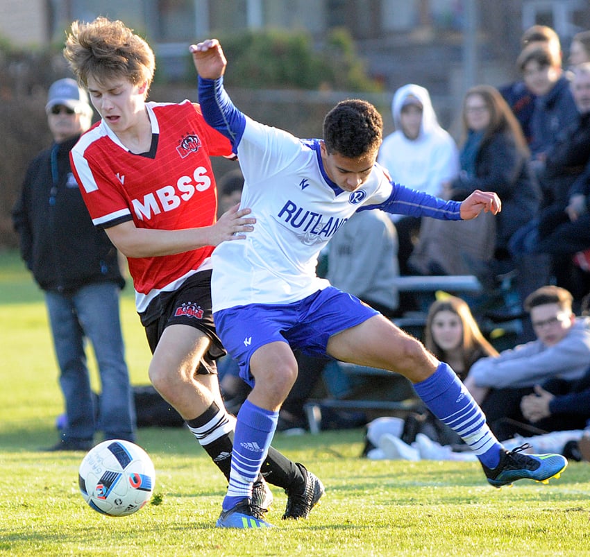 <who>Photo Credit: Lorne White/KelownaNow </who>Shawn Kostiuk of the MBSS Bears, left, and Josh Roth of the RSS Voodoos battle along the sideline.