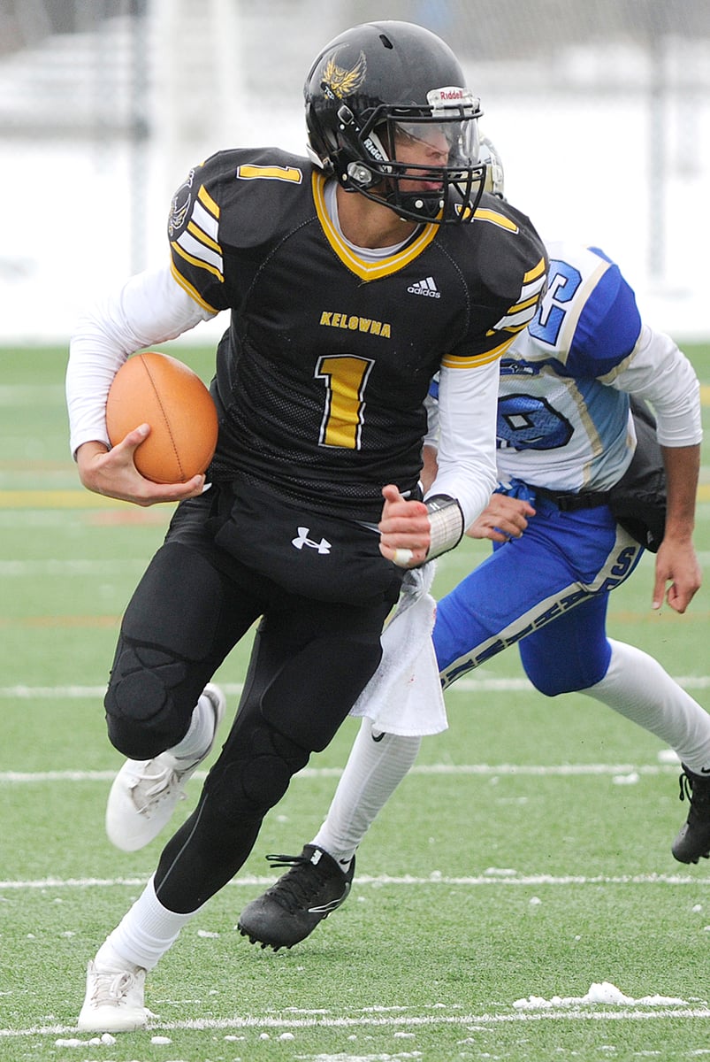 <who>Photo Credit: Lorne White/KelownaNow </who>Owls' QB Isaac Athans threw for 212 yards and three touchdowns.