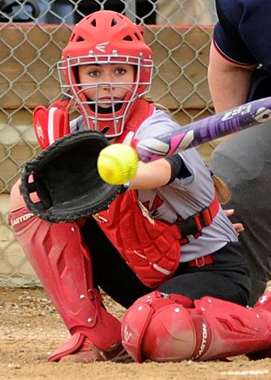 <who>Photo Credit: Lorne White/KelownaNow </who>Danya Truscott-Plitt filled in at catcher when Racquel Bennett was <br>injured in a round-robin game against Prince George. <br>Trustcott-Plitt started the game as the pitcher and earned the win.