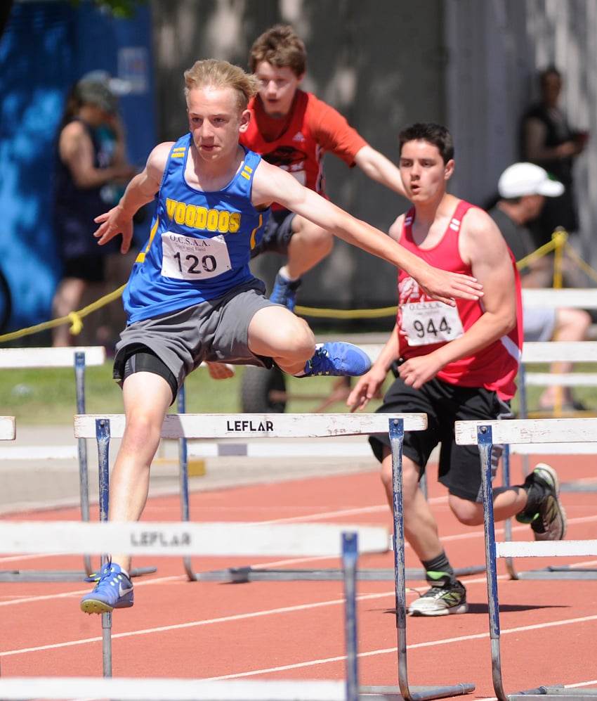<who>Photo Credit: Lorne White/KelownaNow </who>Rutland Voodoos' James Harris set a Valley record in the Grade 8 200-metre hurdles and finished first in the 100-metre hurdles.