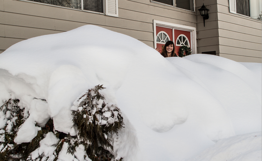 Photo credit: Wendy McAlpine -  ​Deborah Renee stands in the drifts that enveloped her front yard.