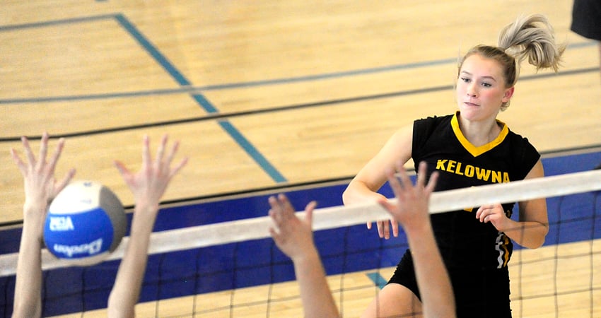 <who>Photo Credit: Lorne White/KelownaNow </who> Karleigh Podolsky of the KSS Owls scored a point on this hit against George Elliot.